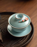 Hand-Sculpted "Azure Petals" Ru Ware Floating Sancai Gaiwan